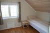 Schlafzimmer mit zwei Einzelbetten